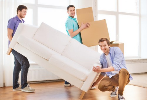 Packed boxes and furniture prepared for a Brompton removal van move