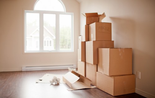 Prepared boxes and furniture ready for a Brompton moving truck