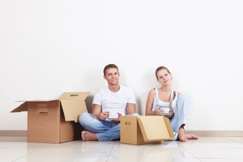 Packed boxes and desks prepared for student removals in Brompton