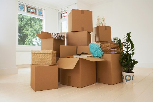 Careful loading of belongings into a removals van in Brompton