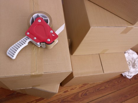 Household moving day in Brompton with furniture and boxes being prepared