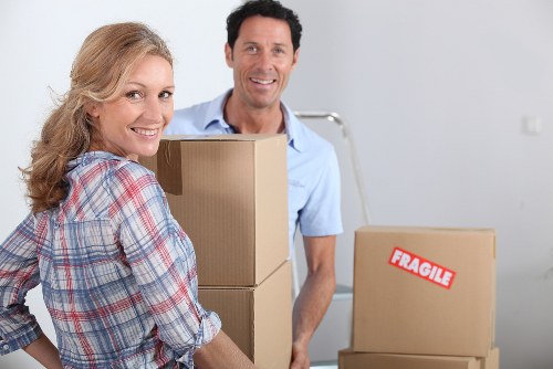 Professional movers following health and safety procedures