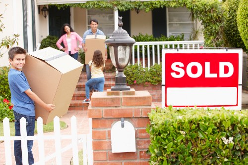 Careful loading of household items for delivery in Brompton