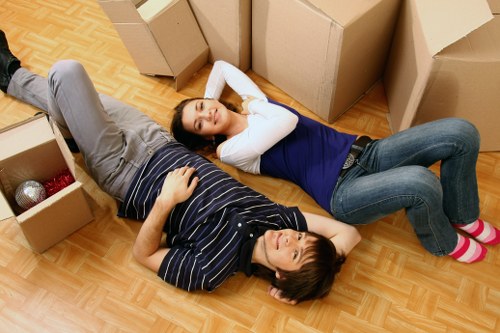 Careful packing and wrapping of fragile household items by Brompton movers